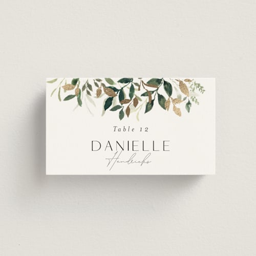 This is a greenery wedding place cards with foil pressed by Itsy Belle Studio called garden serenity printing on signature in placecard