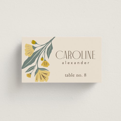 This is a buttercup wedding place cards with foil pressed by Karidy Walker called storybook garden printing on signature in placecard