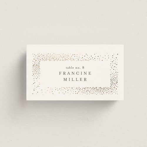 This is a sparkle wedding place cards with foil pressed by Pixel and Hank called flicker printing on signature in placecard