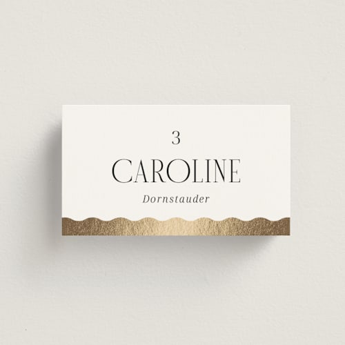 This is a pepper wedding place cards with foil pressed by Olivia Raufman called inventive printing on signature in placecard