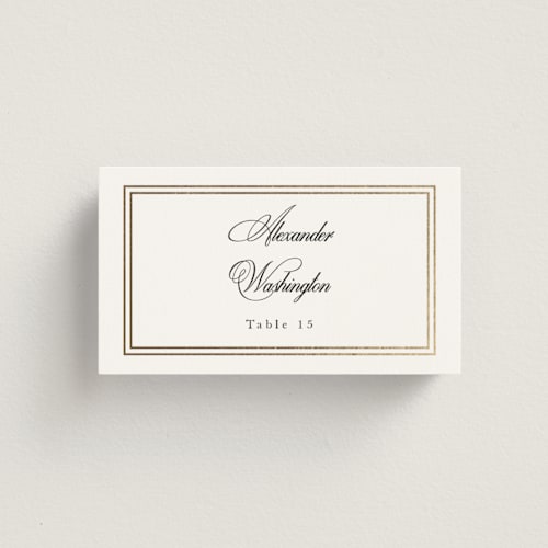 This is a snow wedding place cards with foil pressed by Sarah Brown called traditionalist printing on signature in placecard