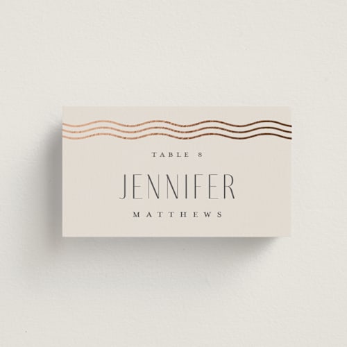 This is a bisque wedding place cards with foil pressed by Kristie Kern called newberry printing on signature in placecard