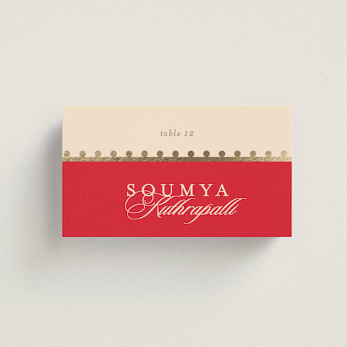 This is a sindoor wedding place cards with foil pressed by Creo Study called mandapam printing on signature in placecard