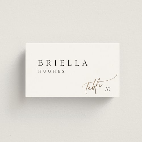 This is a marshmallow wedding place cards with foil pressed by Kaydi Bishop called the wedding printing on signature in placecard