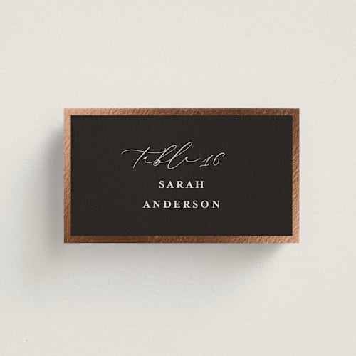 This is a burnt sienna wedding place cards with foil pressed by Susan Moyal called classic love printing on signature in placecard