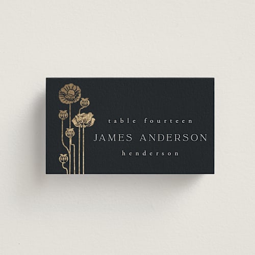 This is a navy wedding place cards with foil pressed by Ana de Sousa called nouveau flowers printing on signature in placecard