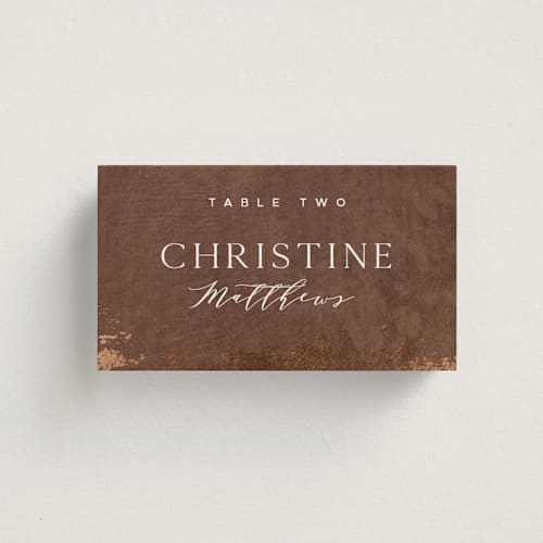 This is a copper wedding place cards with foil pressed by Eric Clegg called woodland hills printing on signature in placecard