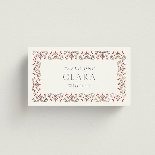 This is a scarlet wedding place cards with foil pressed by Sabrin Deirani called islamic arch printing on signature in placecard