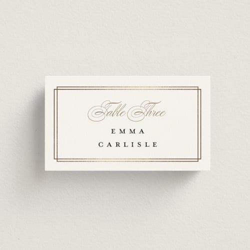 This is a linen wedding place cards with foil pressed by Erica Krystek called timeless printing on signature in placecard