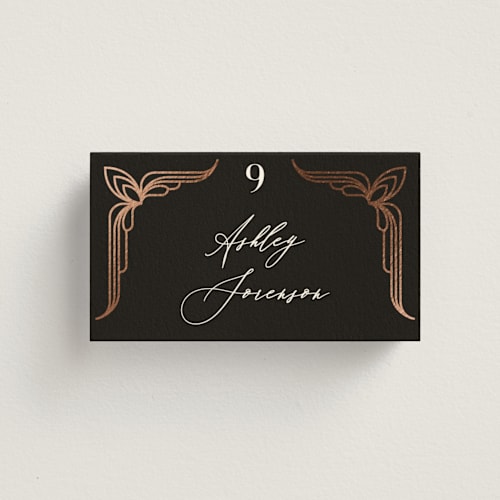 This is a midnight wedding place cards with foil pressed by GeekInk Design called geometric deco printing on signature in placecard
