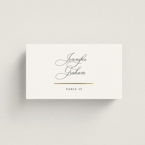 This is a sugar wedding place cards with foil pressed by Jessica Williams called elegant flourish printing on signature in placecard