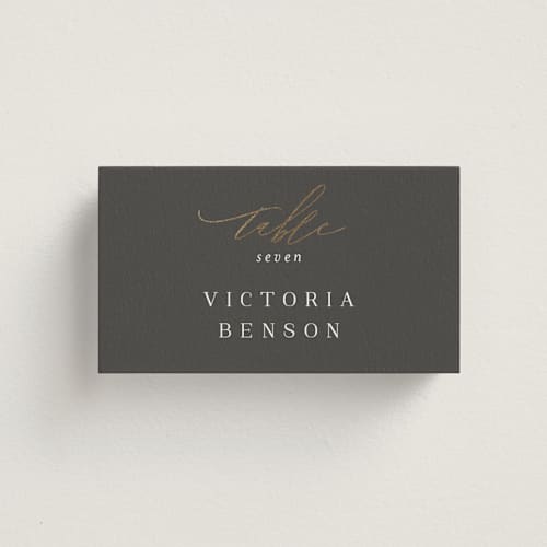 This is a stormy wedding place cards with foil pressed by Jessica Williams called over monogram printing on signature in placecard