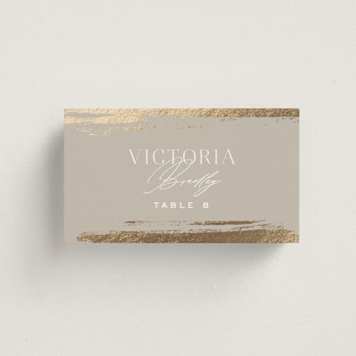 This is a clay wedding place cards with foil pressed by Carolyn Nicks called true love printing on signature in placecard