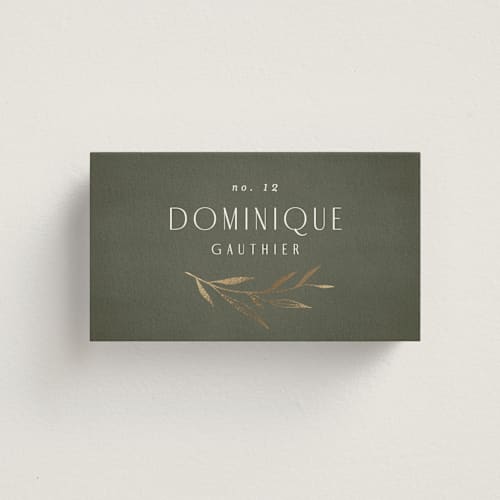 This is a moss wedding place cards with foil pressed by Kelly Schmidt called botanical arches printing on signature in placecard