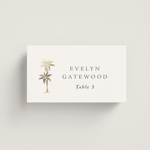 This is a stone wedding place cards with foil pressed by Olivia Raufman called palm monogram printing on signature in placecard