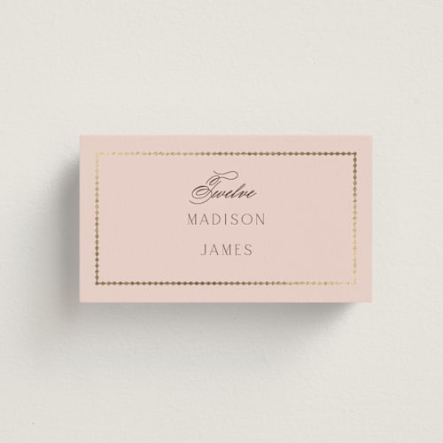 This is a rose quartz wedding place cards with foil pressed by Emily Betts called scallop monogram printing on signature in placecard