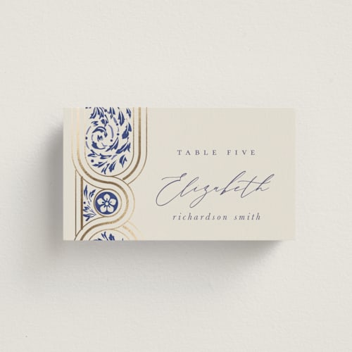 This is a dynasty blue wedding place cards with foil pressed by Ana de Sousa called tiled romance printing on signature in placecard