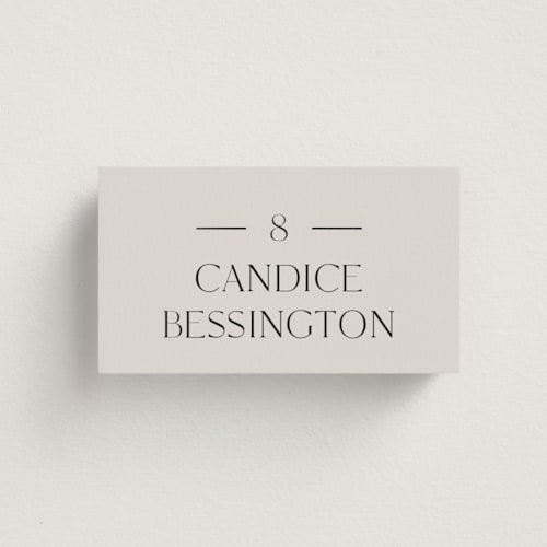 This is a linen wedding place cards with foil pressed by Baumbirdy called floral type arch printing on signature in placecard