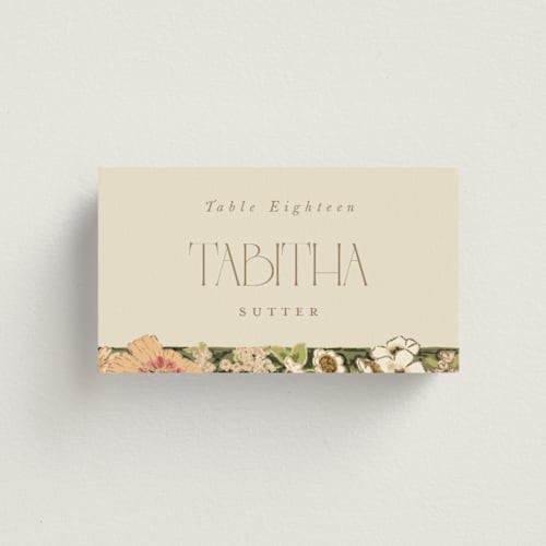 This is a sherbert wedding place cards with foil pressed by Leah Bisch called in the garden printing on signature in placecard