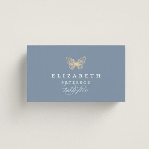This is a cornflower wedding place cards with foil pressed by Grae called meet me in the garden printing on signature in placecard