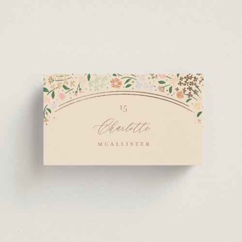 This is a ivory wedding place cards with foil pressed by Jennifer Wick called esther's garden printing on signature in placecard