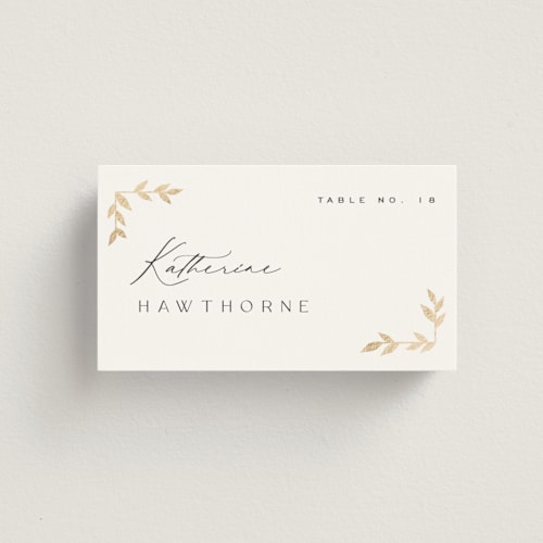 This is a lily wedding place cards with foil pressed by Owl and Toad called courtyard printing on signature in placecard