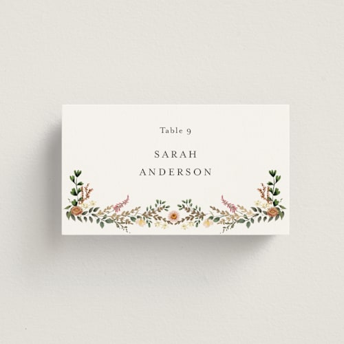 This is a blush wedding place cards with foil pressed by Susan Moyal called blooming vine printing on signature in placecard