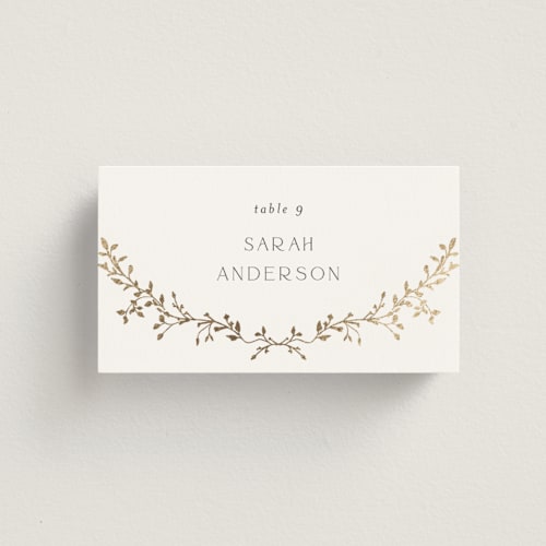 This is a alabaster wedding place cards with foil pressed by Susan Moyal called delicate vine printing on signature in placecard
