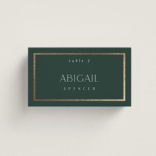 This is a evergreen wedding place cards with foil pressed by Nicole Walsh called regal printing on signature in placecard