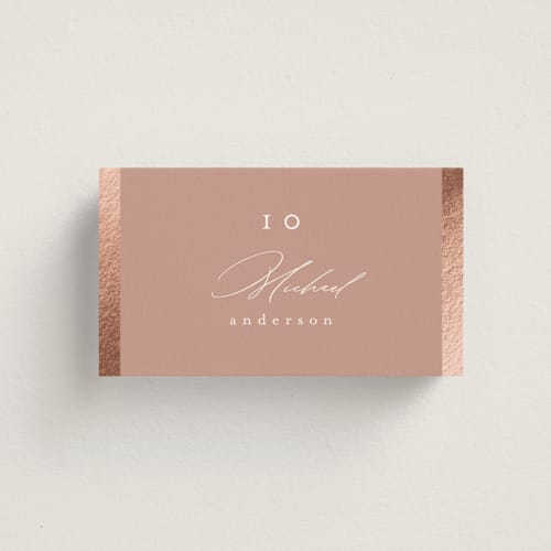 This is a rose wedding place cards with foil pressed by Nicole Walsh called surround printing on signature in placecard