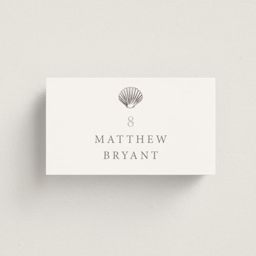 This is a mist wedding place cards with foil pressed by Hannah Bowman called simple seashell printing on signature in placecard