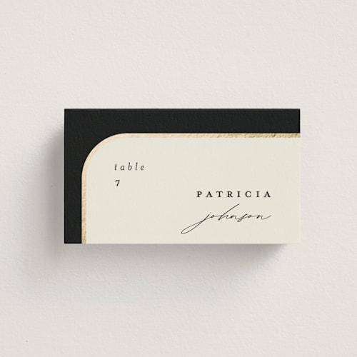 This is a black tie wedding place cards with foil pressed by Carolyn Nicks called tuxedo printing on signature in placecard