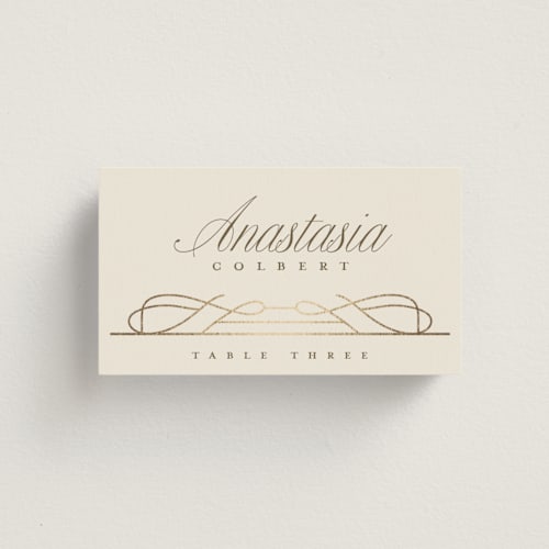 This is a cream wedding place cards with foil pressed by Katie Zimpel called simple art nouveau printing on signature in placecard