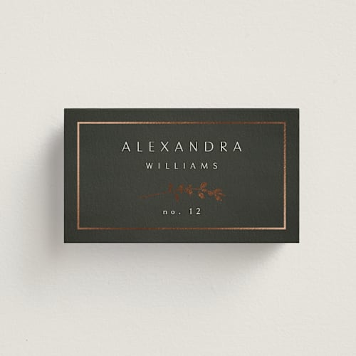 This is a ivy wedding place cards with foil pressed by Kelly Schmidt called quince printing on signature in placecard