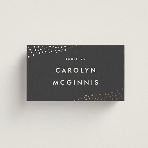 This is a soft black wedding place cards with foil pressed by Camille Robinson called modern glam printing on signature in placecard