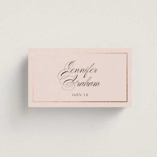 This is a blush wedding place cards with foil pressed by Jessica Williams called bianca printing on signature in placecard