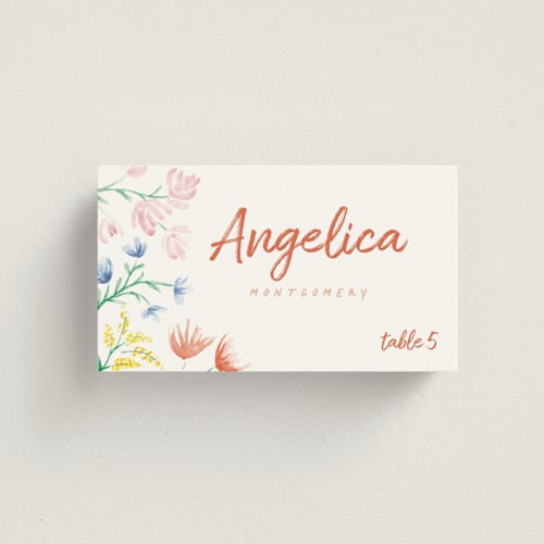 This is a peach wedding place cards with standard by Zani van Zyl called flora printing on signature in placecard