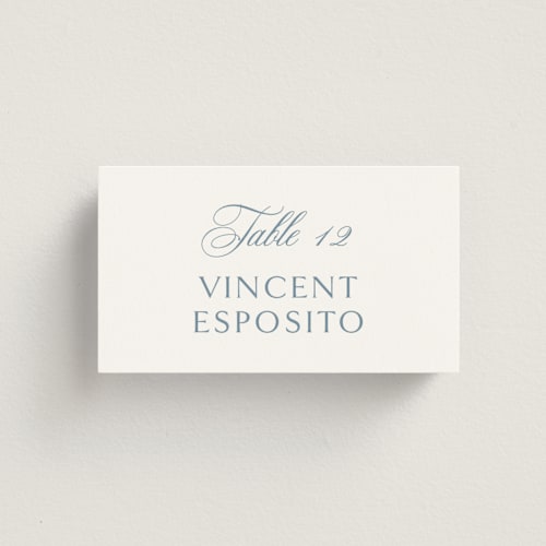 This is a dusty blue wedding place cards with standard by Jennifer Postorino called coastal charm printing on signature in placecard