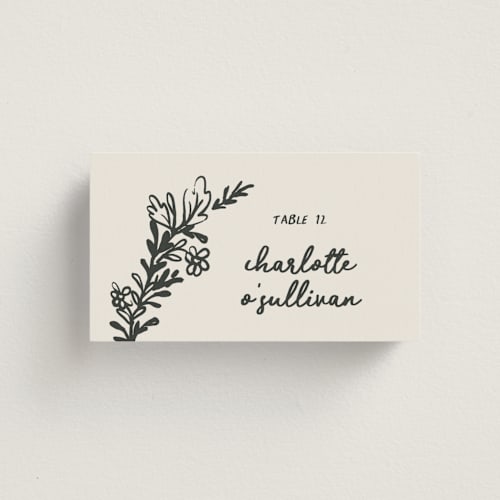 This is a ink wedding place cards with standard by Kelly Watkins called botanical crest printing on signature in placecard