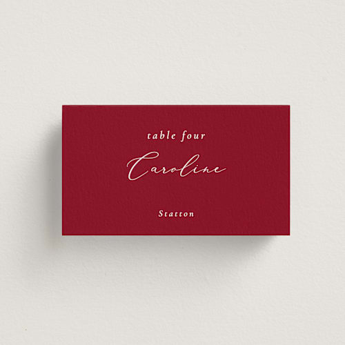 This is a crimson wedding place cards with standard by Corinne Malesic called bow printing on signature in placecard