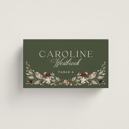 This is a vert wedding place cards with standard by Erin Deegan called fleur sauvage printing on signature in placecard