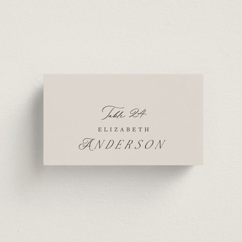 This is a stone wedding place cards with standard by Phrosné Barwood called etched floral printing on signature in placecard