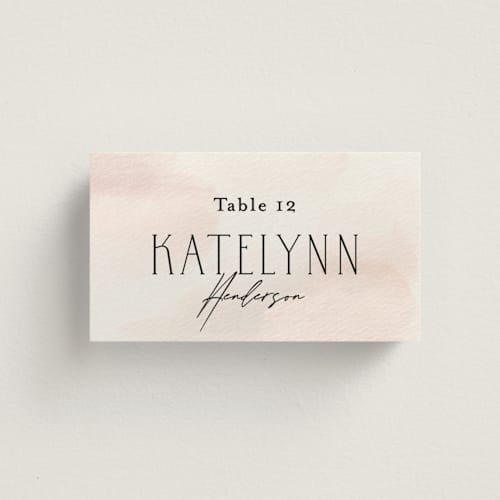 This is a blush wedding place cards with standard by Itsy Belle Studio called first light printing on signature in placecard