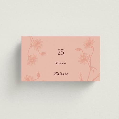 This is a burgundy wedding place cards with standard by Nazia Hyder called museum printing on signature in placecard