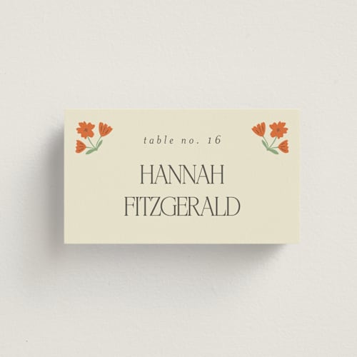 This is a coral wedding place cards with standard by Morgan Kendall called vintage wildflowers printing on signature in placecard