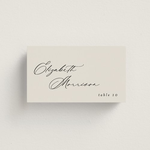 This is a ivory wedding place cards with standard by Carolyn Nicks called kinkaid printing on signature in placecard