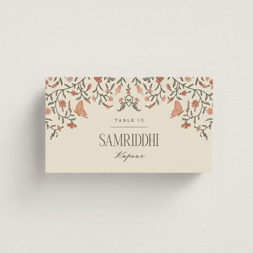 This is a terracotta wedding place cards with standard by Jenna Holcomb called tapestry printing on signature in placecard