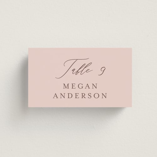 This is a blush wedding place cards with standard by Lucrecia Caporale called delicate monogram printing on signature in placecard