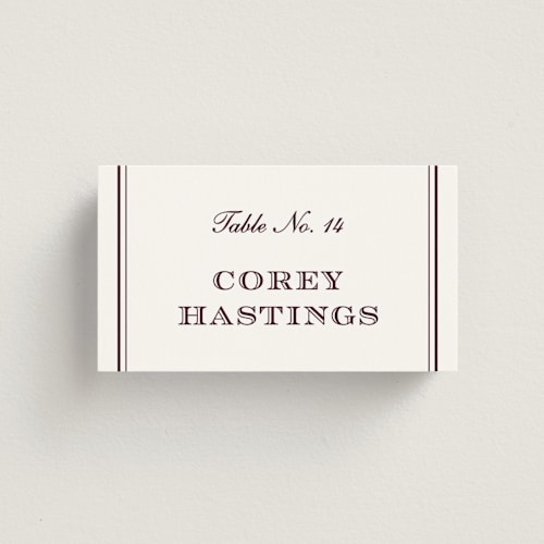 This is a burgundy wedding place cards with standard by Stacey Meacham called engraved names printing on signature in placecard