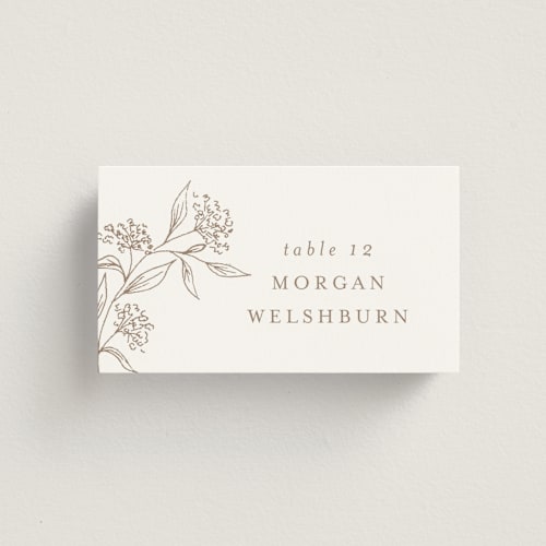 This is a taupe wedding place cards with standard by Chris Griffith called monogrammed printing on signature in placecard